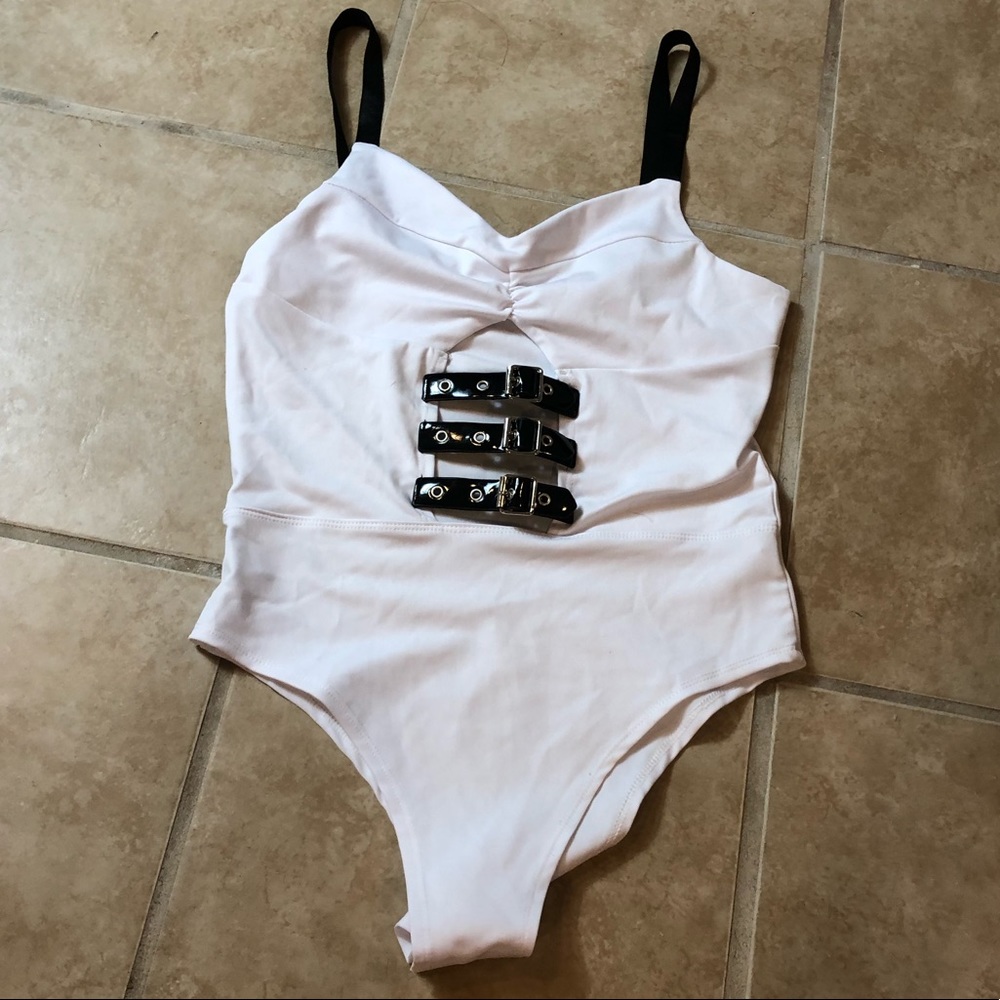 White cut out bodysuit with PU buckle detail